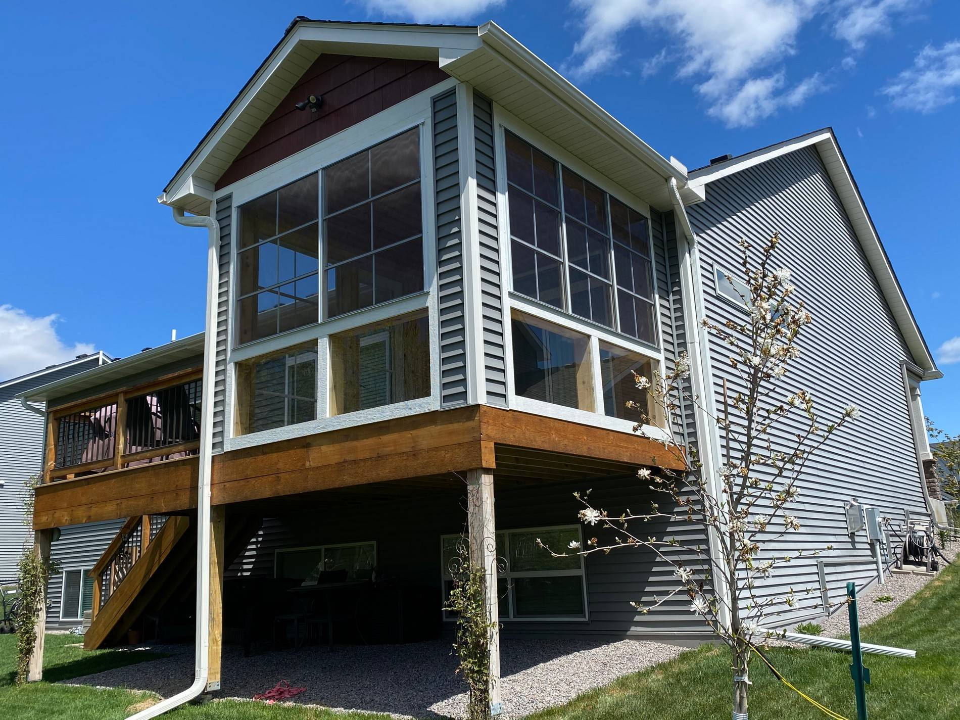 Porch 2nd level porch with attached deck, exterior view